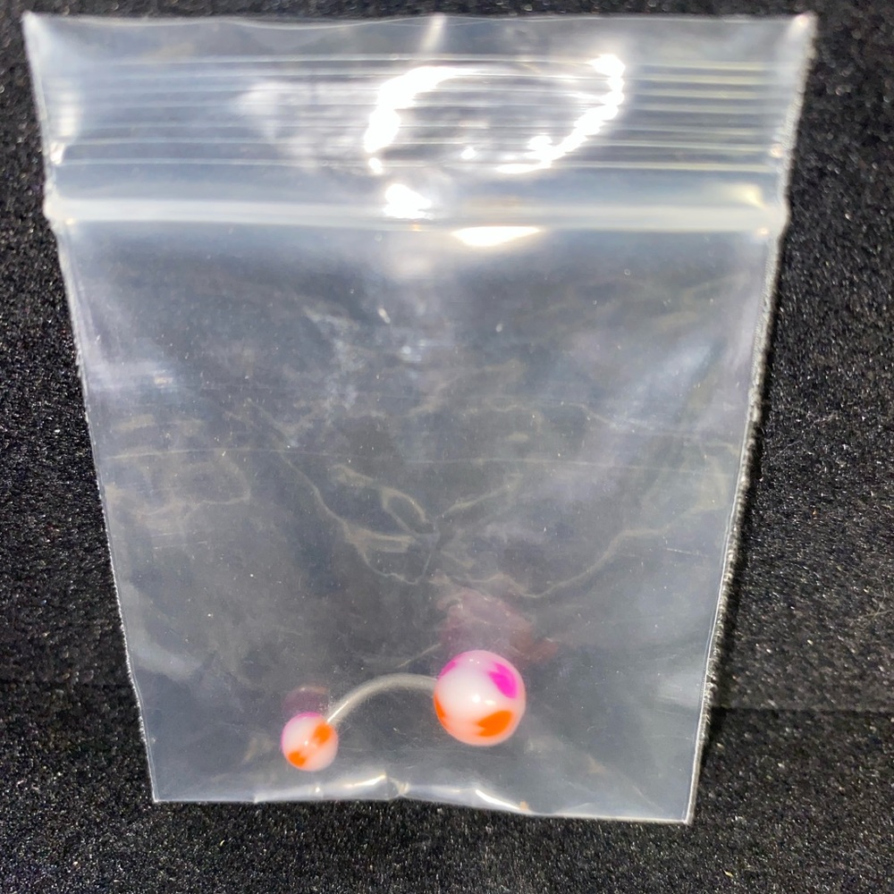 pink and orange belly ring